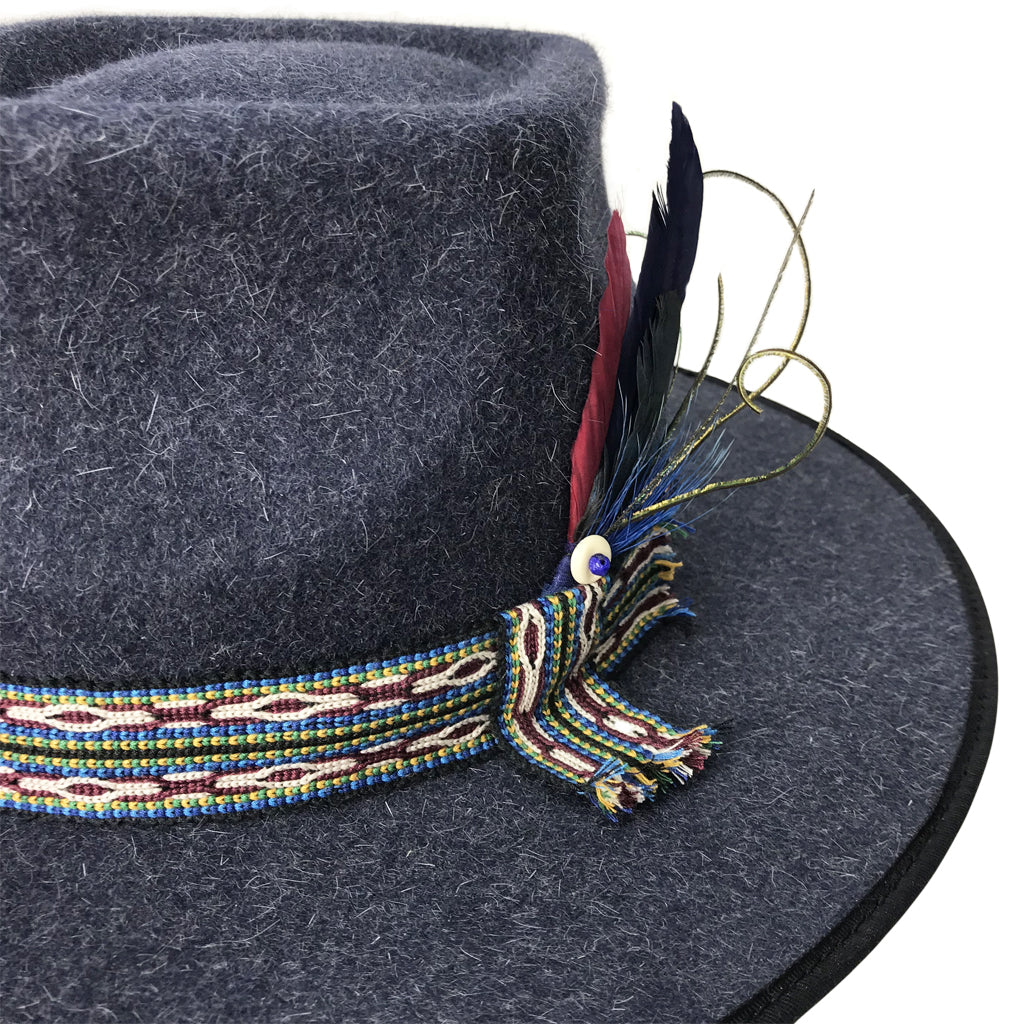 hatWRKS original with hand woven hatband with feathers and bead